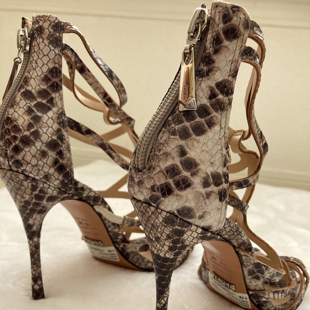 A new Schutz high heel shoe . Snake color.